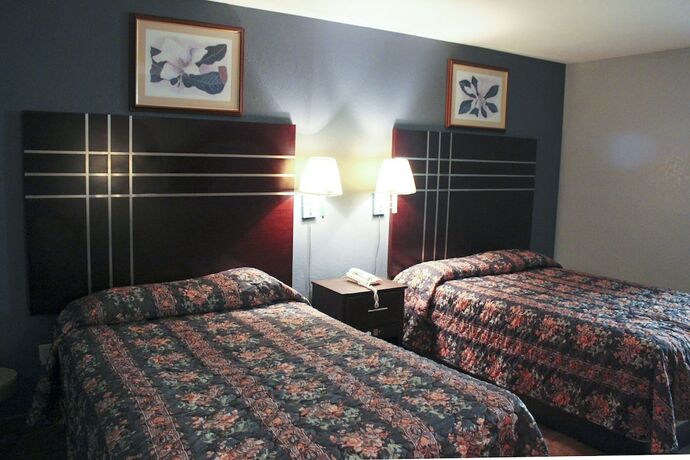 Imagen de la habitación del Hotel The Shades Motel. Foto 18