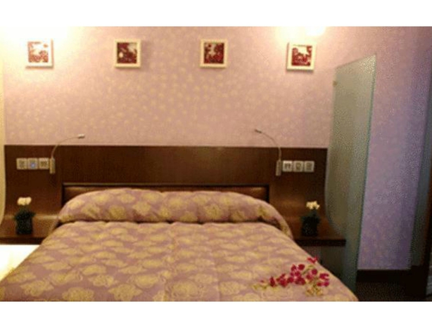 Imagen de la habitación del Hotel The Shalimar. Foto 9