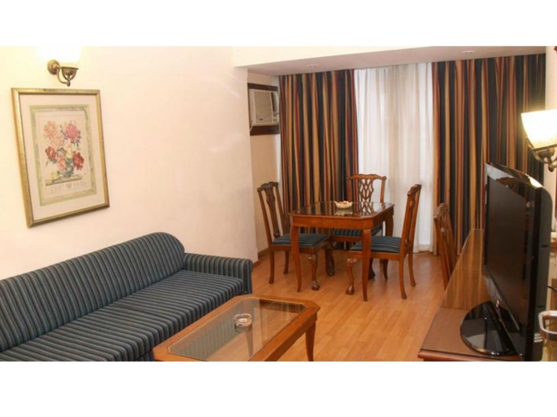 Imagen de la habitación del Hotel The Shalimar. Foto 14