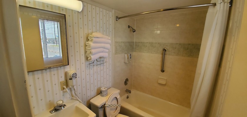 Imagen de la habitación del Hotel The Shangri La Motel. Foto 11