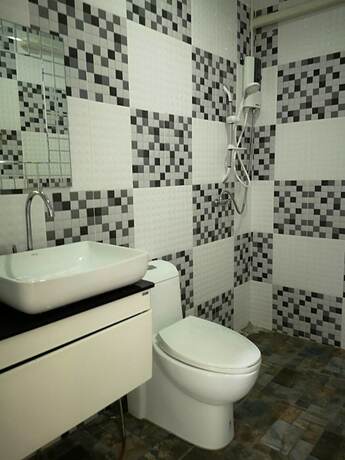 Imagen de la habitación del Hotel The Shark Resort. Foto 9
