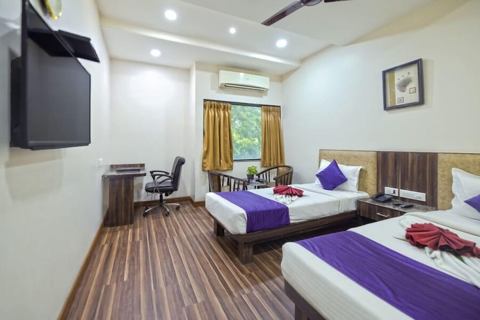 Imagen de la habitación del Hotel The Sheetal International, Raipur. Foto 3