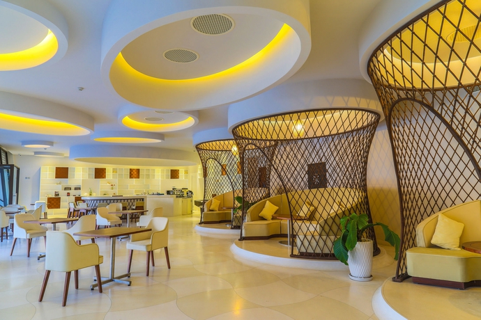 Imagen del bar/restaurante del Hotel The Shells Resort and Spa Phu Quoc. Foto 3