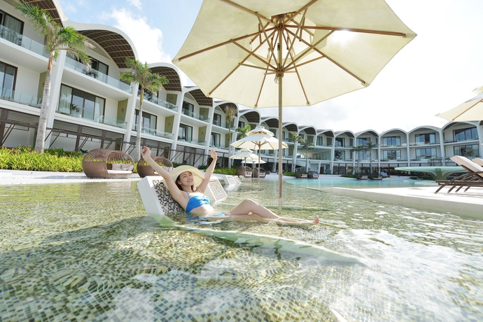 Imagen de la piscina del Hotel The Shells Resort and Spa Phu Quoc. Foto 15
