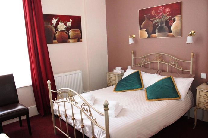 Imagen del bar/restaurante del Hotel The Sherwood - Guest House. Foto 3
