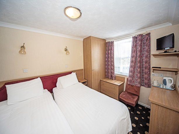 Imagen de la habitación del Hotel The Sherwood Palm, Torquay Beach. Foto 5