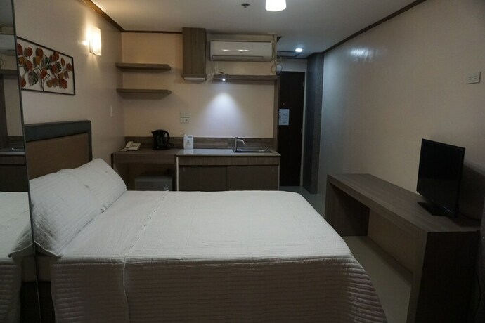 Imagen de la habitación del Hotel The Shilla Philia. Foto 23