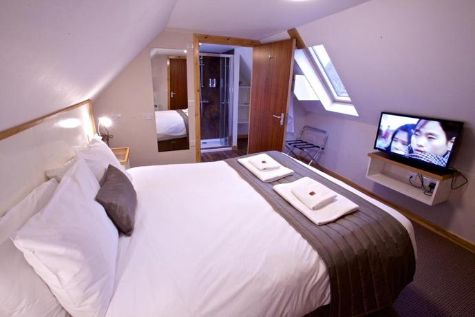 Imagen de la habitación del Hotel The Shore. Foto 2