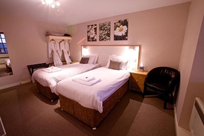 Imagen de la habitación del Hotel The Shore. Foto 7