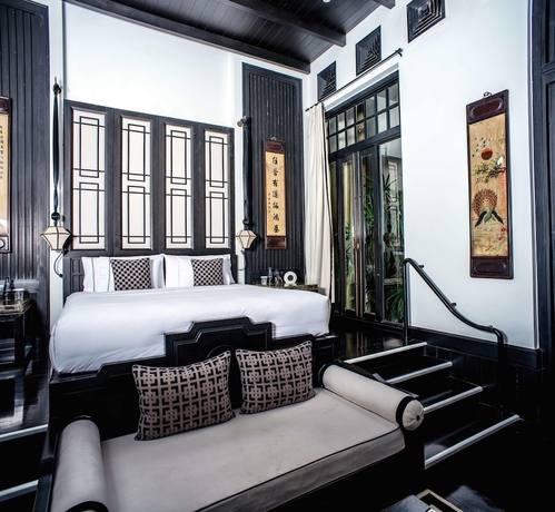 Imagen de la habitación del Hotel The Siam. Foto 2