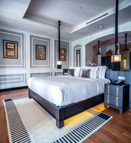 Imagen de la habitación del Hotel The Siam. Foto 9