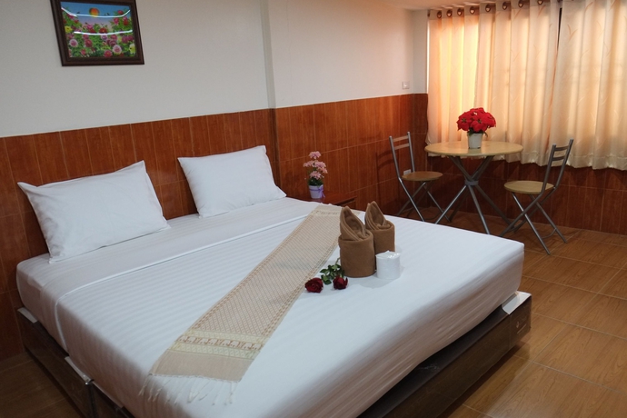 Imagen de la habitación del Hotel The Siam Guest House. Foto 4