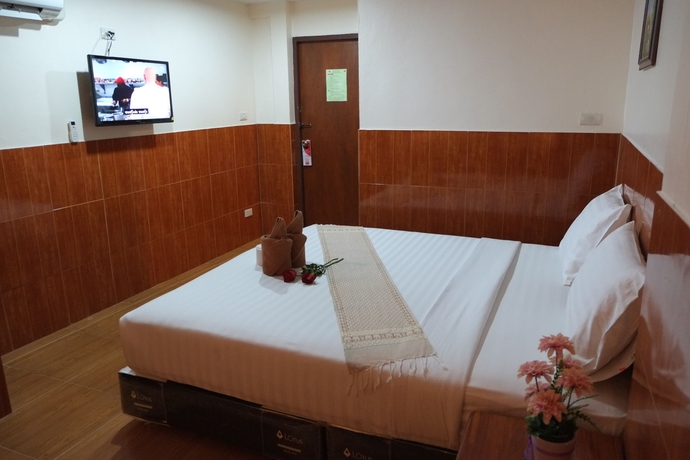 Imagen de la habitación del Hotel The Siam Guest House. Foto 8