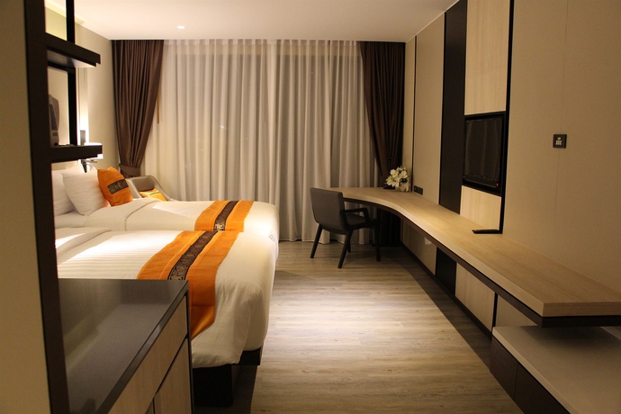 Imagen de la habitación del Hotel The Siamese. Foto 11