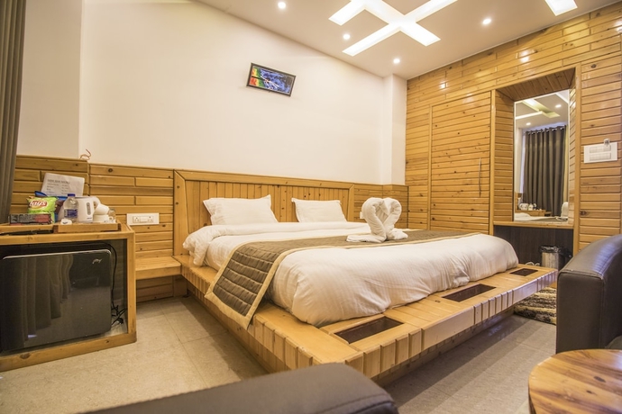 Imagen de la habitación del Hotel The Siddhartha. Foto 16