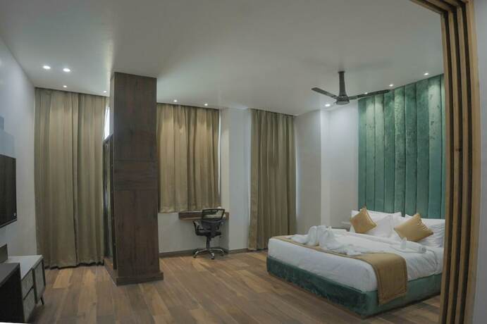 Imagen de la habitación del Hotel The Signate Royale. Foto 13