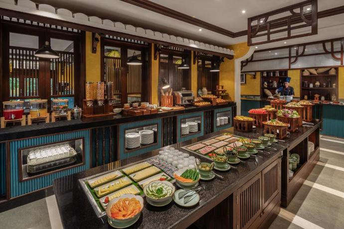 Imagen del bar/restaurante del Hotel The Signature Hoi An. Foto 5