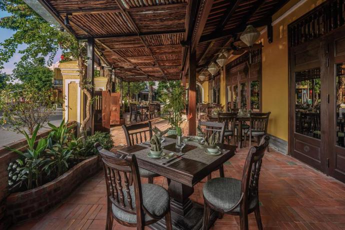 Imagen del bar/restaurante del Hotel The Signature Hoi An. Foto 6