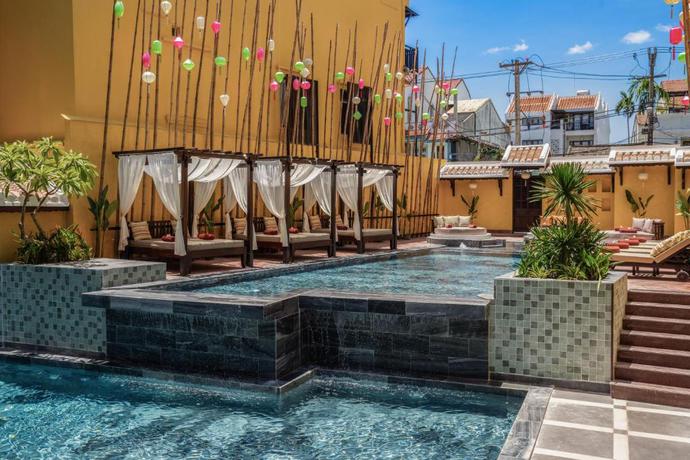 Imagen de la piscina del Hotel The Signature Hoi An. Foto 31