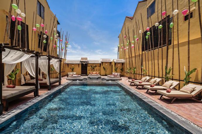 Imagen de la piscina del Hotel The Signature Hoi An. Foto 32