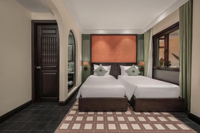 Imagen de la habitación del Hotel The Signature Hoi An. Foto 9