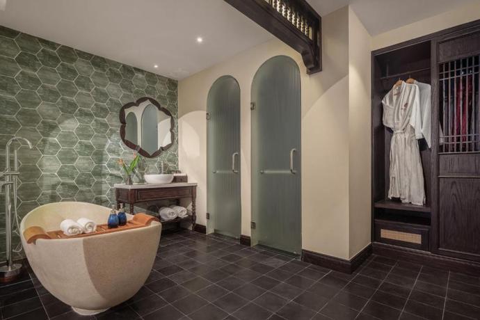 Imagen de la habitación del Hotel The Signature Hoi An. Foto 11