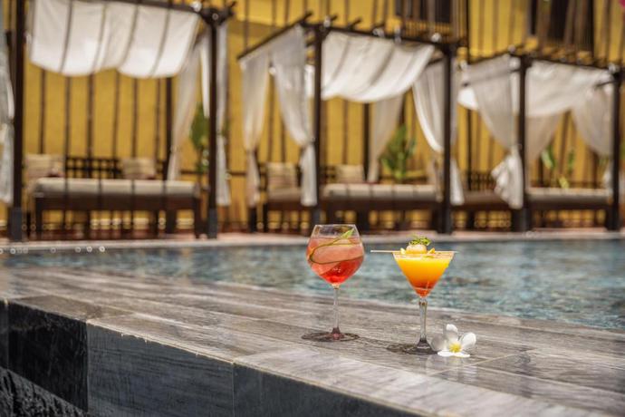 Imagen de la piscina del Hotel The Signature Hoi An. Foto 34
