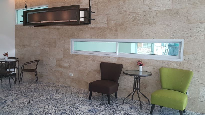 Imagen de la habitación del Hotel The Sila Sriracha. Foto 10