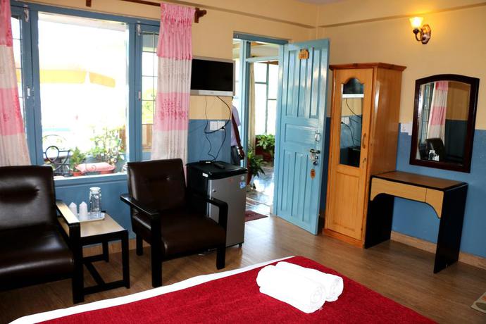 Imagen de la habitación del Hotel The Silver Oaks Inn. Foto 4