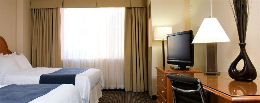 Imagen de la habitación del Hotel The Simon Sydney. Foto 5