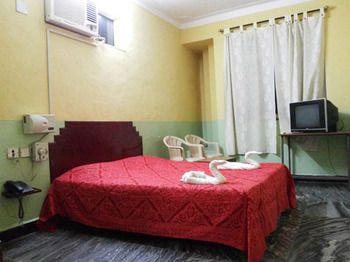 Imagen de la habitación del Hotel The Sincro. Foto 7