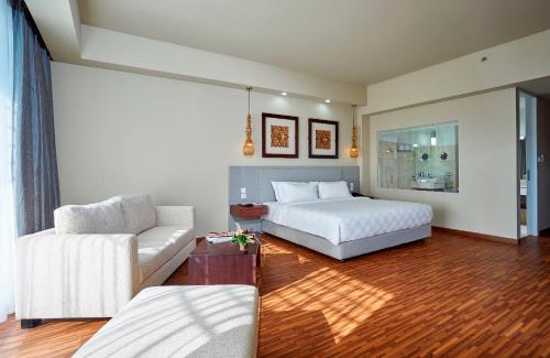 Imagen de la habitación del Hotel The Sintesa Jimbaran Bali. Foto 4