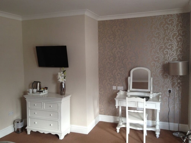 Imagen de la habitación del Hotel The Sir William Fox. Foto 16