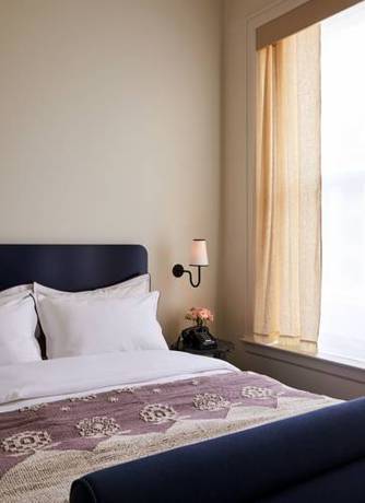 Imagen de la habitación del Hotel The Siren. Foto 2