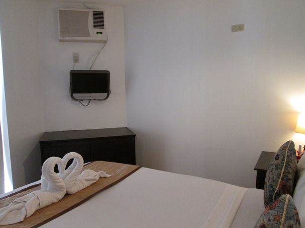 Imagen de la habitación del Hotel The Sitio Boracay Villas and Suites. Foto 4