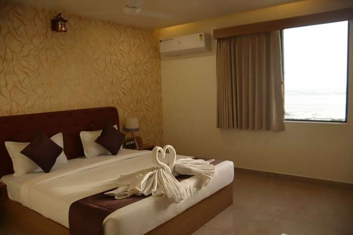 Imagen de la habitación del Hotel The Sky Comfort Beach, Dwarka. Foto 17
