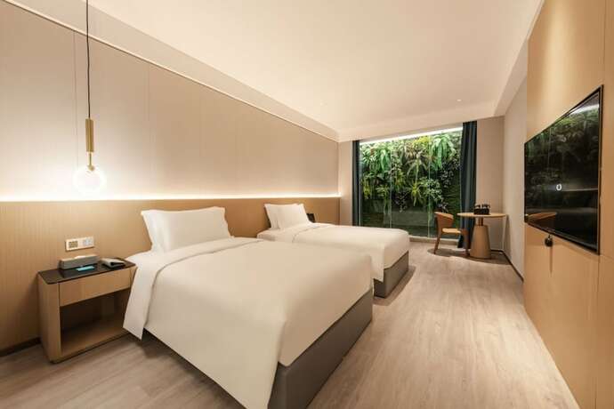Imagen de la habitación del Hotel The Skytel Shenzhen Central Park. Foto 11
