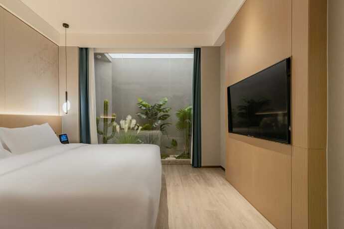 Imagen de la habitación del Hotel The Skytel Shenzhen Central Park. Foto 13