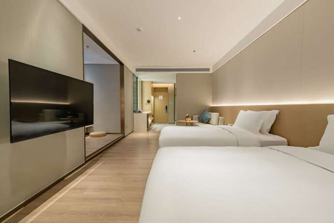 Imagen de la habitación del Hotel The Skytel Shenzhen Central Park. Foto 14