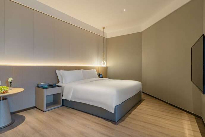 Imagen de la habitación del Hotel The Skytel Shenzhen Central Park. Foto 17