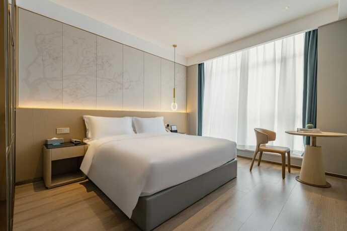 Imagen de la habitación del Hotel The Skytel Shenzhen Central Park. Foto 20