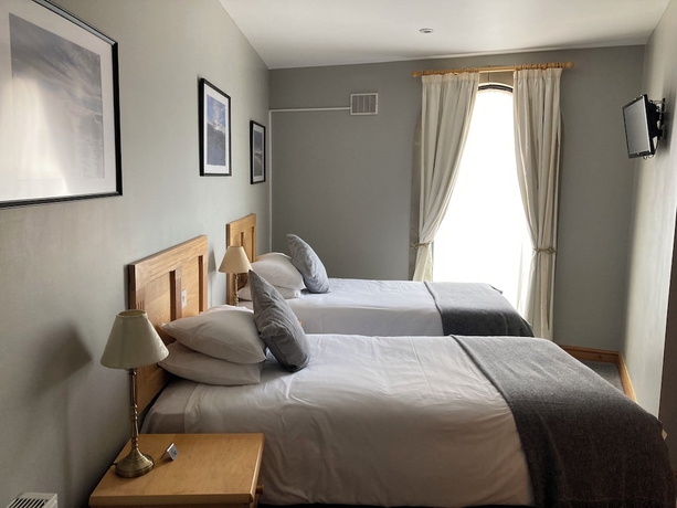 Imagen de la habitación del Hotel The Sleepwell Inn. Foto 13