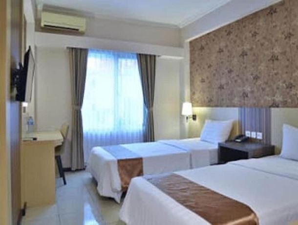 Imagen de la habitación del Hotel The Sleepzzz Hotel Senayan. Foto 4