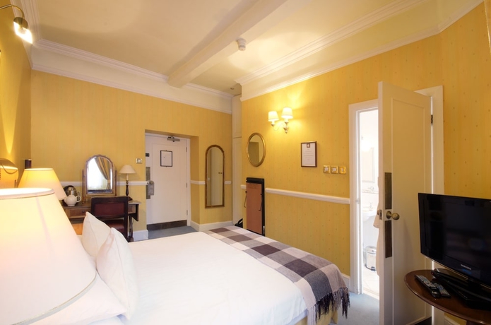 Imagen de la habitación del Hotel The Snooty Fox. Foto 3