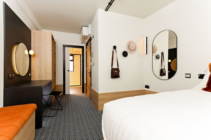 Imagen de la habitación del Hotel The Snug Townhouse. Foto 19