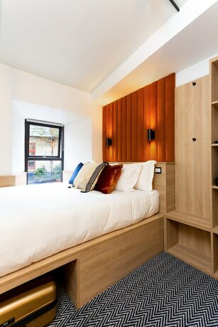 Imagen de la habitación del Hotel The Snug Townhouse. Foto 20