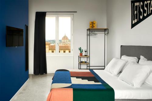 Imagen de la habitación del Hotel The Social Hub Florence Lavagnini. Foto 4