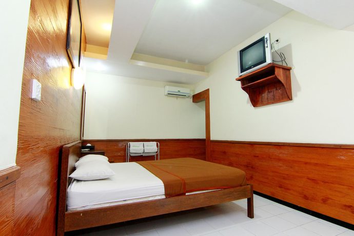 Imagen de la habitación del Hotel The Soemarsono, Depok. Foto 5