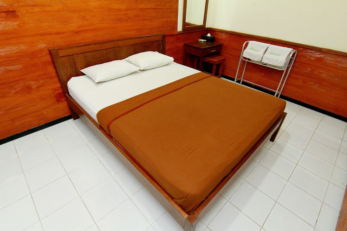 Imagen de la habitación del Hotel The Soemarsono, Depok. Foto 8