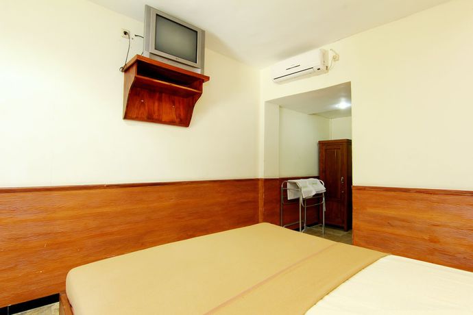Imagen de la habitación del Hotel The Soemarsono, Depok. Foto 9